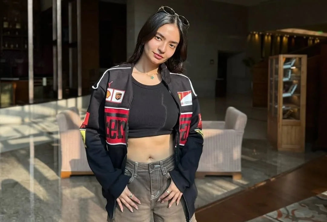 Unleash Your Inner Racer with the Iconic Black Ferrari F1 Jacket Worn by Anushka Sen