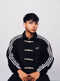 malemodel styling the Black Chinese New Year jacket, showcasing the aesthetic Y2K drop-shoulder fit
