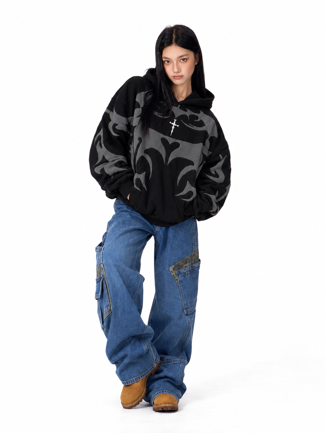 Back side view on a female model displaying the highly tactile 3D puff print typography raised off the black fleece