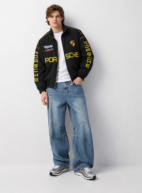 Front view of the Black Exotix Porsche Racing Jacket, highlighting the premium parachute fabric and heavy front embroidery