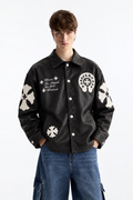 front perspective of a male model wearing the black Gothic cross leather jacket, highlighting the rear horseshoe crest and arm patch detailing
