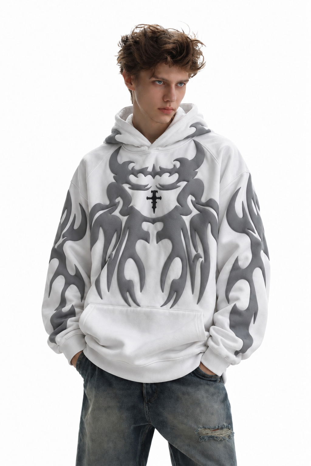 Male model wearing the pristine white baggy streetwear hoodie, highlighting the high-contrast puff print graphics for winter