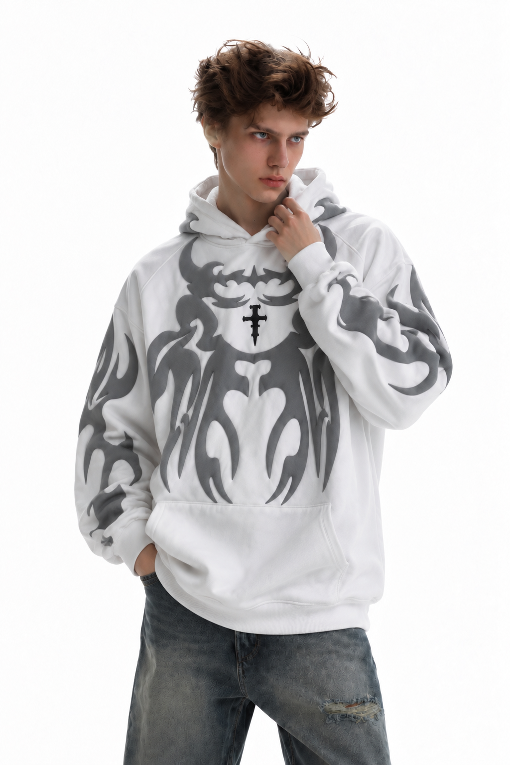 Front shot of the male model in the white Exotix depth hoodie focusing on the minimalist stringless hood and kangaroo pocket