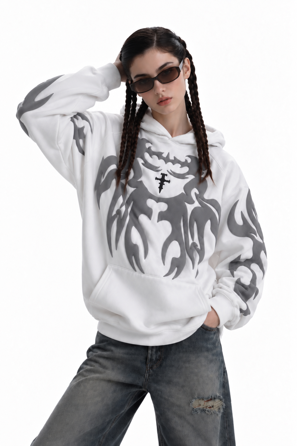 Lifestyle shot of the girl in the white baggy hoodie, highlighting the premium winter warmth and drop shoulders