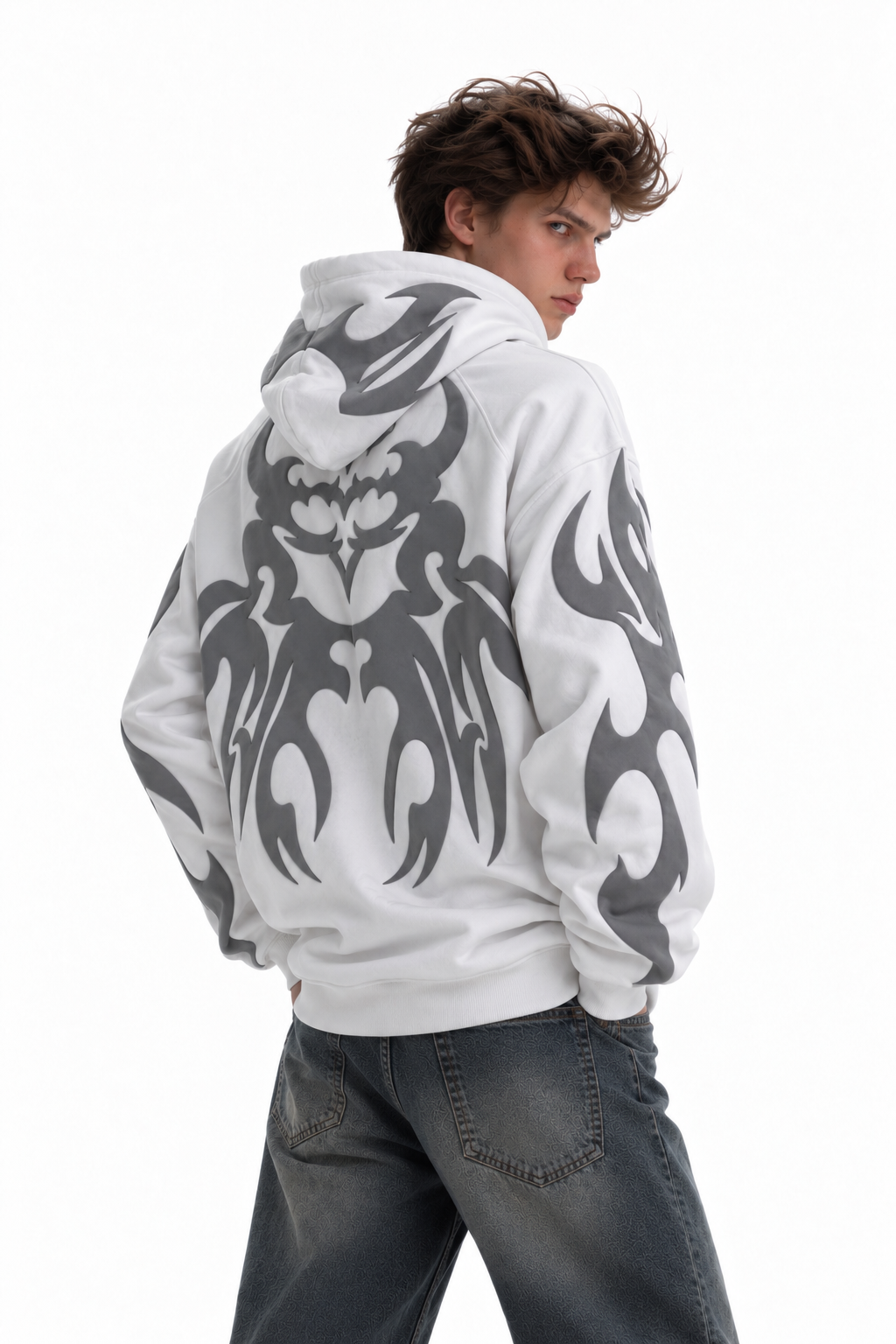 Close up of the 3D puff print graphic on the white heavyweight fleece hoodie worn by a male model