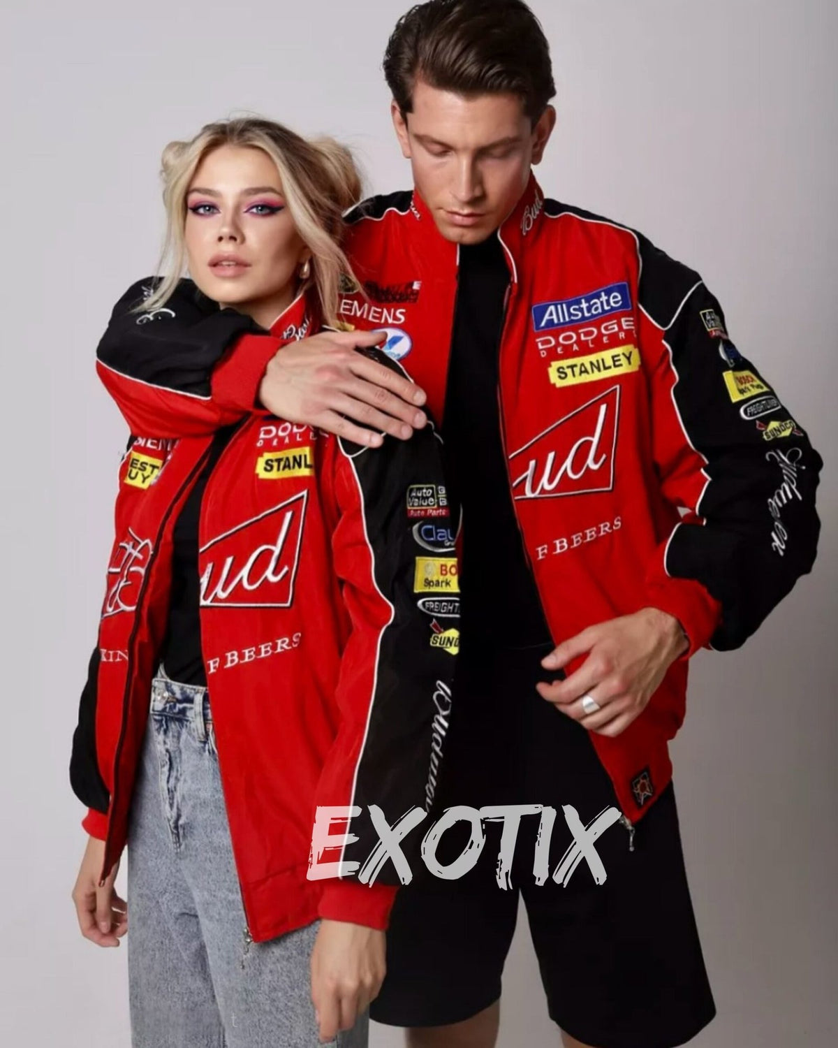 Female model wearing the unisex Exotix Red Budweiser Racing Jacket, demonstrating the relaxed Y2K streetwear drape