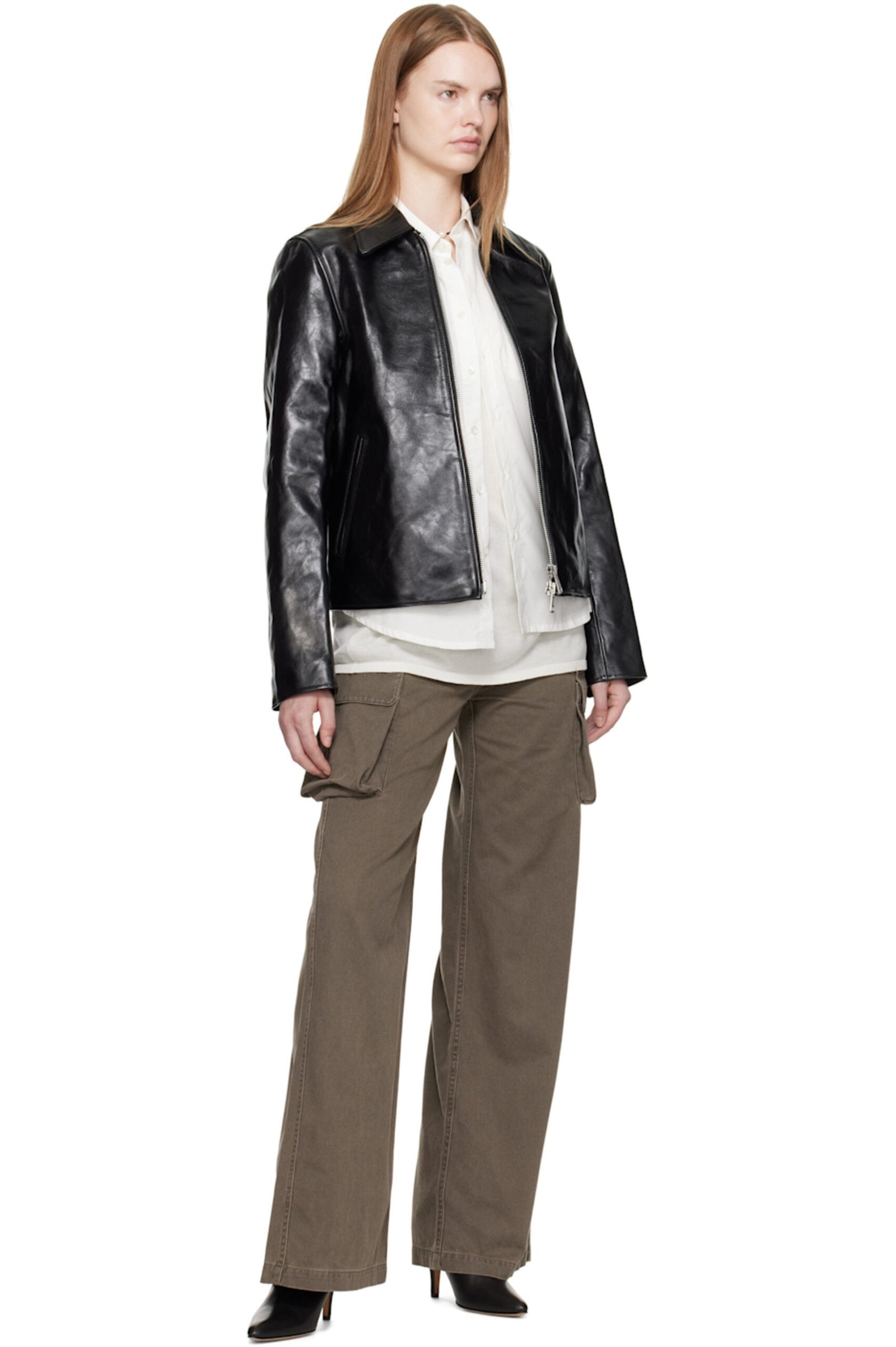 Urban streetwear lifestyle shot highlighting how to style the women's crop leather jacket with high-waisted baggy denim