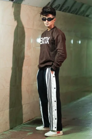 Black snap button trackpant with Exotix brown sweatshirt