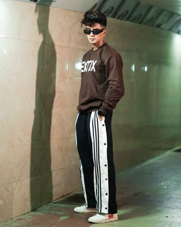 Black snap button trackpant with Exotix brown sweatshirt