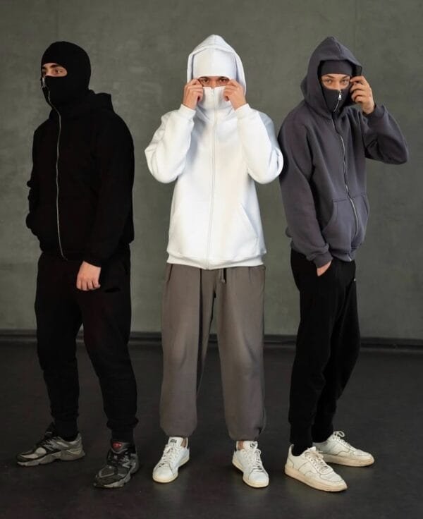 Group of people wearing the Unisex Ninja Balaclava Hoodie