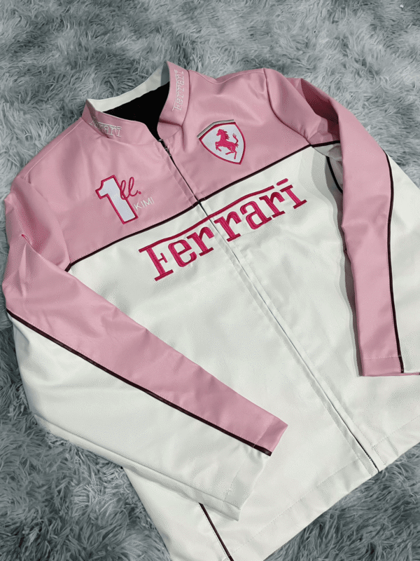 Front view of the Limited Edition Pink Ferrari Leather Jacket showcasing its sleek design and bold pink hue