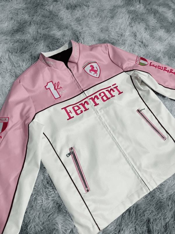 Side profile of the Limited Edition Pink Ferrari Leather Jacket, featuring Ferrari-inspired design elements and a dynamic silhouette