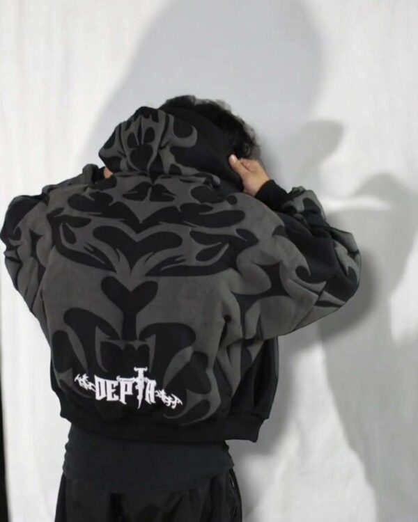 Model Wearing Tribal Shadow Depth Oversized Hoodie – Trendy Streetwear Look