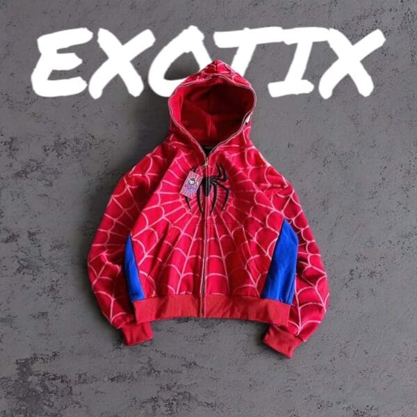 A red and blue Spidey hoodie with a spider emblem is laid flat on a grey surface, with the white EXOTIX brand name prominently displayed above.