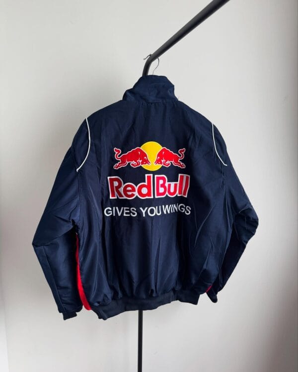 Back view of Red Bull Racing Jacket showing "Gives You Wings" embroidered branding