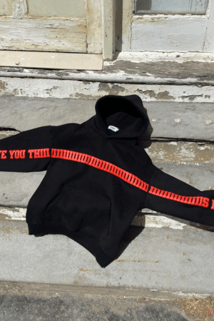 Black I Love You This Much Hoodie laid flat outdoors with bold red print on sleeves – Exotix couple hoodie