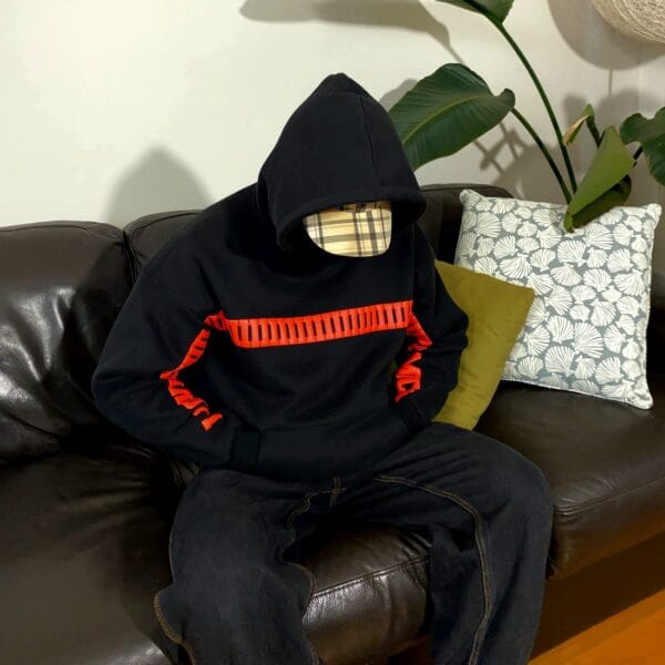 Exotix unisex love hoodie styled casually on couch – perfect romantic hoodie for couples in India