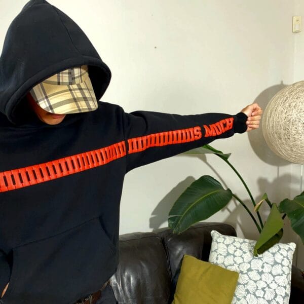Close-up of hoodie sleeve with THIS MUCH in bold red font – I Love You hoodie by Exotix India