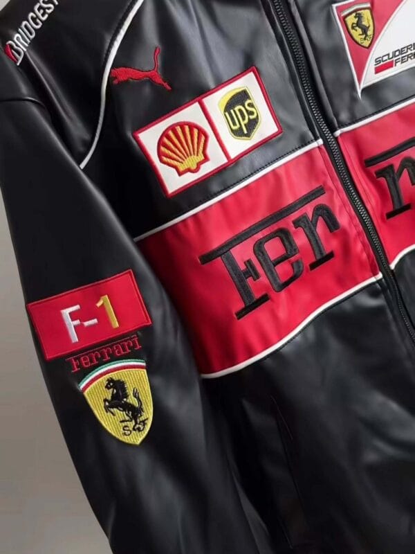 Detailed shot of Ferrari F1 jacket sleeves with Shell, UPS, and Puma branding – Exotix
