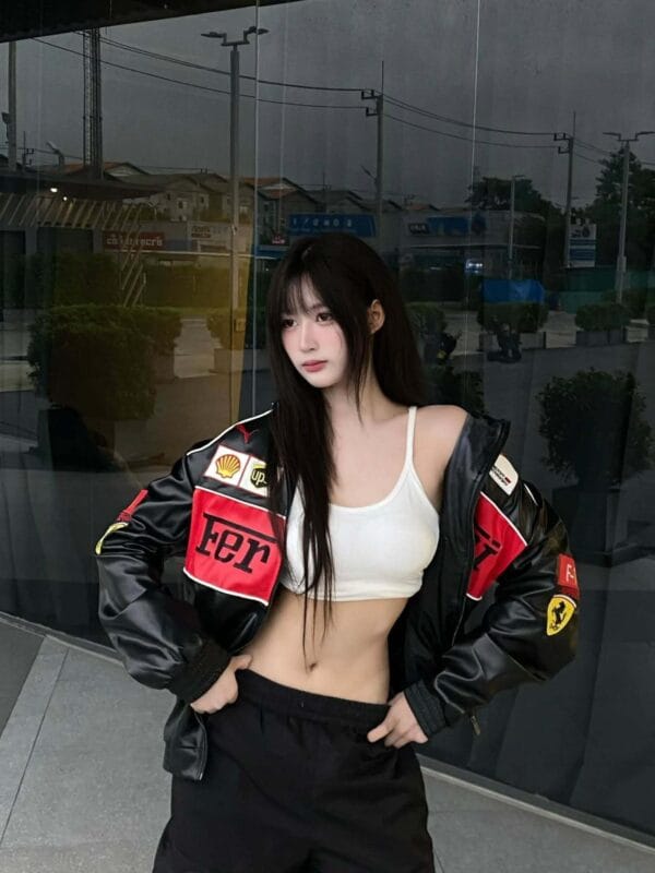 Model posing in premium Ferrari leather jacket showing full front design – Exotix streetwear