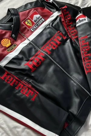 Front view of Ferrari Olympus Jacket by Exotix – black and red leather racing jacket with embroidered Ferrari and Olympus patches