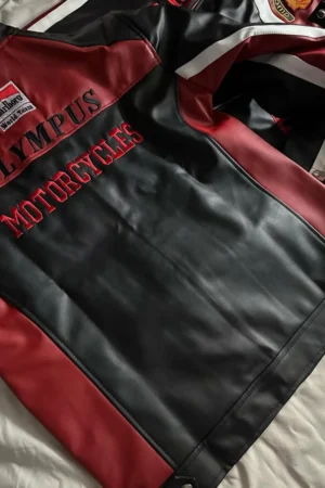 Back view of Olympus Ferrari motorcycle jacket – black and red leather jacket with Olympus and Marlboro racing patches