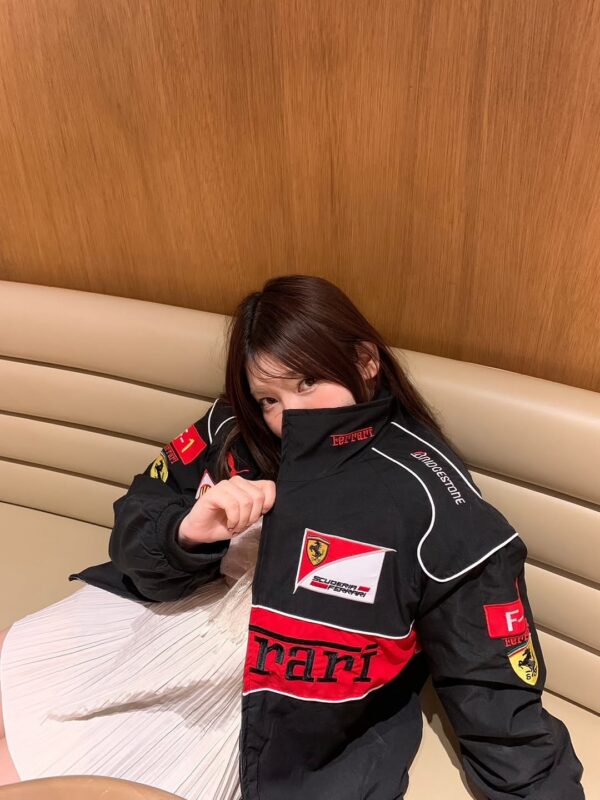 Black Ferrari motorsport jacket embroidered logo close-up design