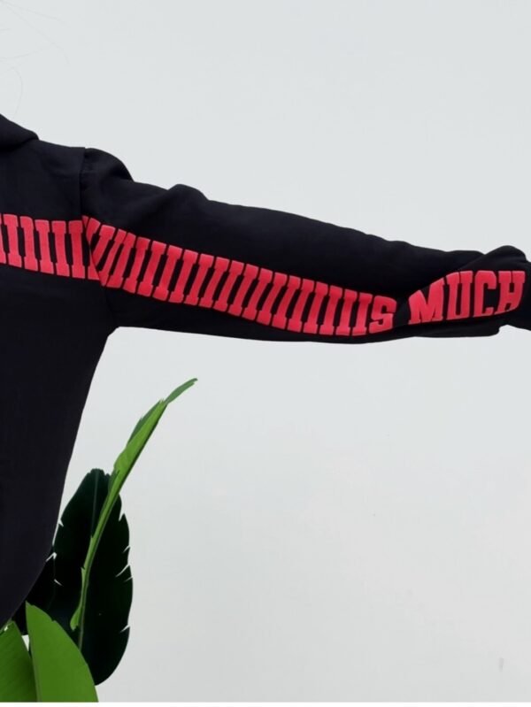 Close-up of I Love You Thiiis Much Hoodie sleeve showcasing red statement love message print by Exotix.