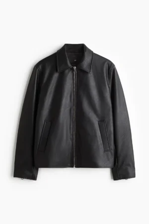 Black cropped boxy leather jacket flat lay front view with collar and zip closure - Exotix women's outerwear