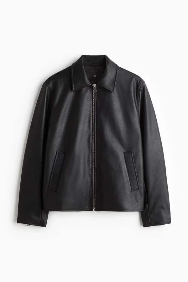 Black cropped boxy leather jacket flat lay front view with collar and zip closure - Exotix women's outerwear