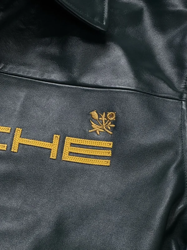 Close-up of embroidered stitching and Porsche 993 logo