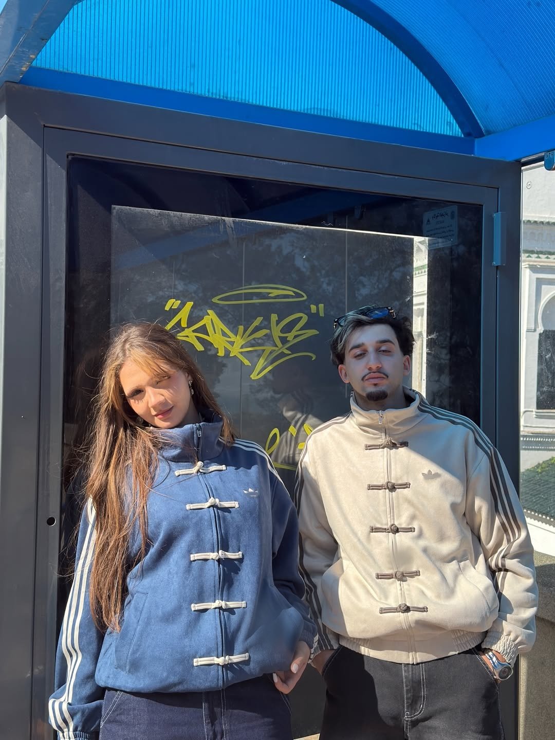 Chinese New Year Jacket – Exotix CNY Edition Chinese New Year jacket by Exotix – couple wearing matching traditional-inspired toggle jackets in blue and cream with street style aesthetic