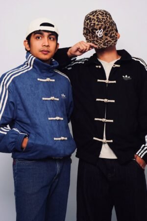 Exotix Navy Blue and Black Chinese New Year Jacket for men featuring traditional toggle buttons and streetwear design by Exotix India