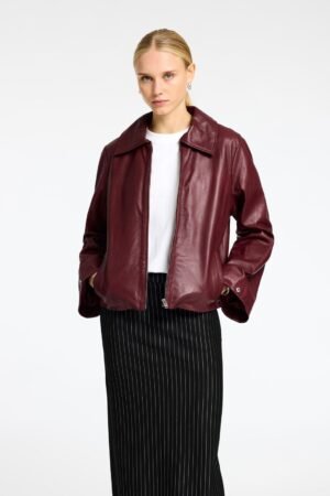Exotix Burgundy crop leather jacket for women by Exotix front view premium faux leather cropped biker jacket streetwear style