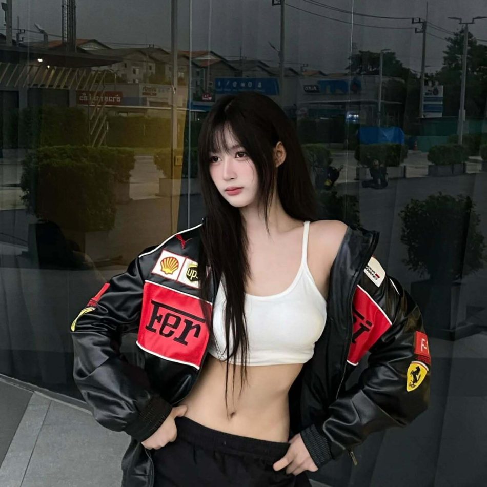 How to Style a Black Ferrari Jacket Like Celebrities in 2025 (With Fabric & Fit Tips) Model posing in premium Ferrari leather jacket showing full front design – Exotix streetwear